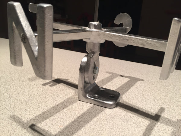 Hand-cast weathervane base in aluminium