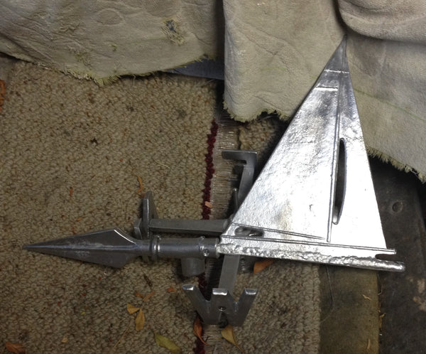 Hand-cast sailboat weathervane in aluminium